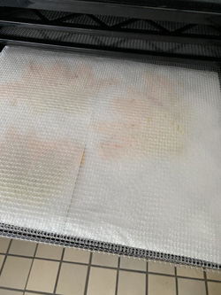 on top of paper towel put a plastic tray cover